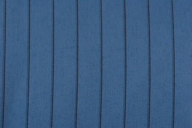 Antistatic polyester fabric with conductive carbon-yarn grid used in the Precision operation gown